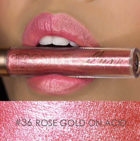 Rose gold lip gloss application, featuring shade #36 Rose Gold on Acid, showcasing shiny, soft pink lips.