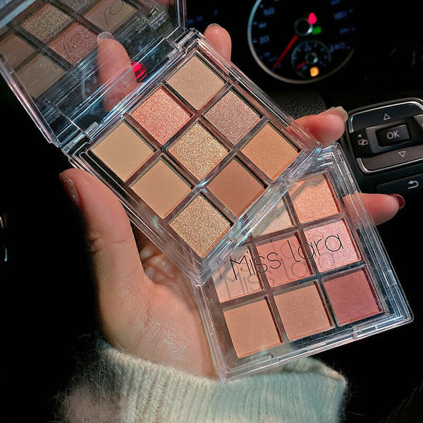 New Arrival Charming Eyeshadow Palette featuring 9 colorful matte and shimmer shades for vibrant eye looks.