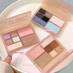 Three eye shadow palettes: Two-way Thrust, Cold Water Thrills, and Tamsui Island showcasing diverse matte and glitter shades.