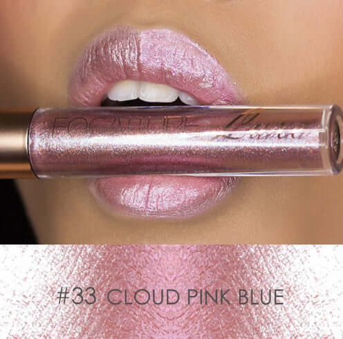 Focallure #33 Cloud Pink Blue lip gloss on full lips, showcasing a shimmering pink-blue hue.