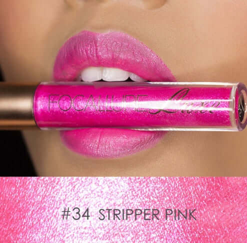 Model showcasing FOCALURE lip gloss in #34 Stripper Pink with vibrant, shiny finish on lips.