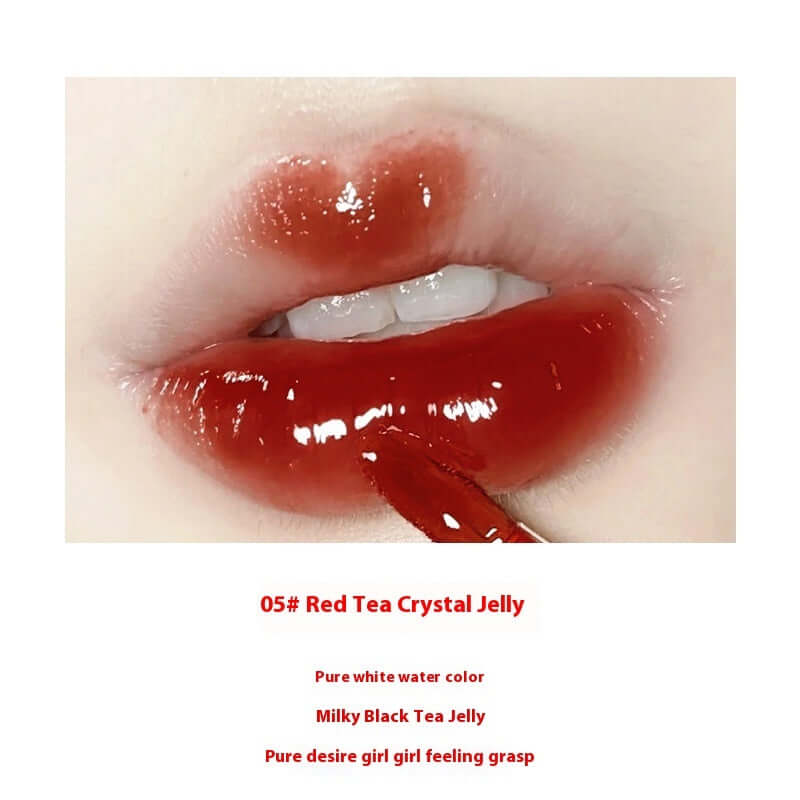 Glossy lips wearing 05# Red Tea Crystal Jelly with a milky texture and vibrant hydration for a fresh look.