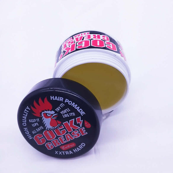 Cock Grease hair pomade in a jar, featuring high-quality styling for a strong hold with a yellow paste texture.