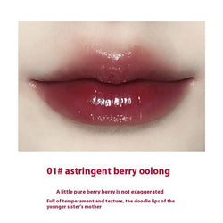 Close-up of lips wearing 01# Astringent Berry Oolong Lip Gloss, showcasing a moisturizing and vibrant finish.