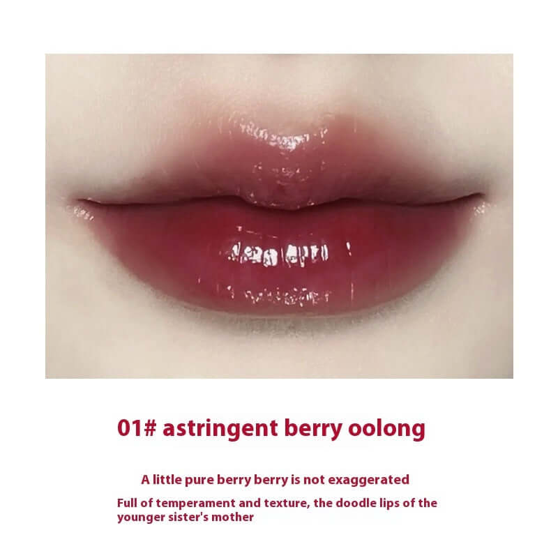 Close-up of lips wearing 01# Astringent Berry Oolong Lip Gloss, showcasing a moisturizing and vibrant finish.