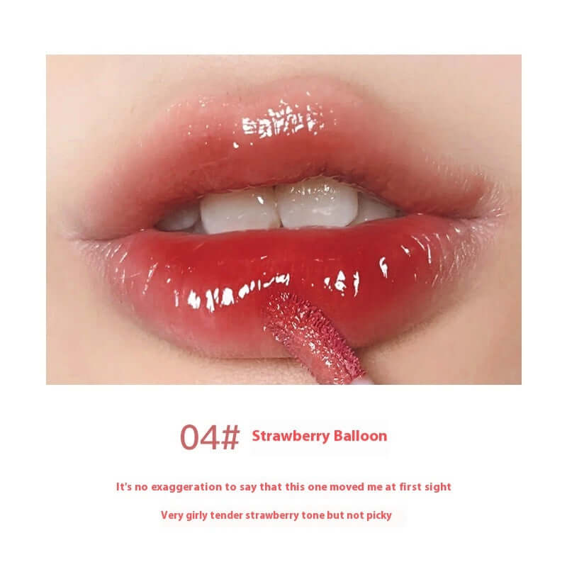Strawberry Balloon lip gloss applied on lips, showcasing a glossy finish in a vibrant girly tone.