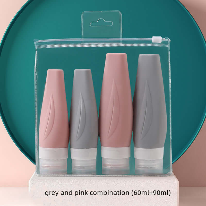 Travel shampoo bottle set in grey and pink, featuring 60ml and 90ml silicone containers for convenience.