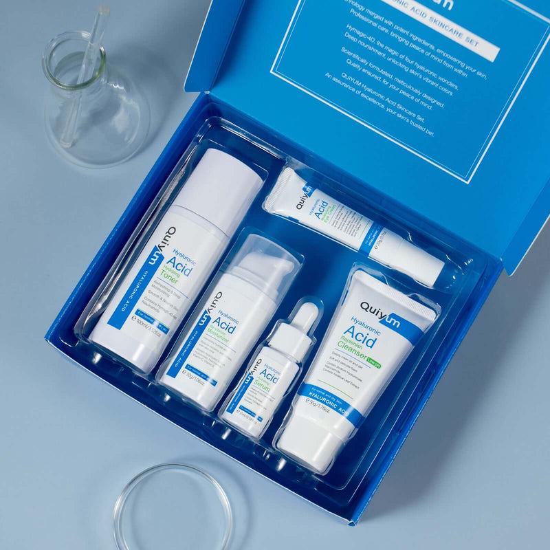 Hyaluronic Acid Skin Care Set includes facial cleanser, toner, essence, eye cream, and face cream in a blue package.