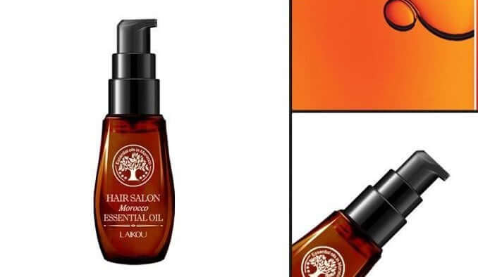 Bottle of Moroccan essential hair oil with pump dispenser, showcasing its amber color and sleek design.