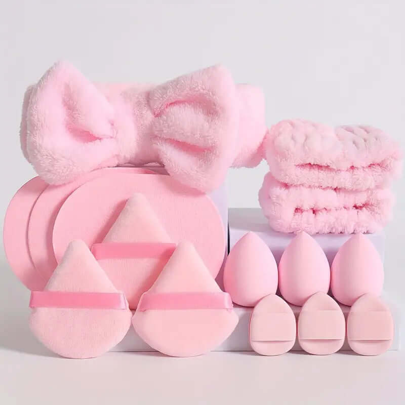 Pink cosmetic egg makeup set with puffs and headband for face wash skin care. Includes sponges and soft accessories.