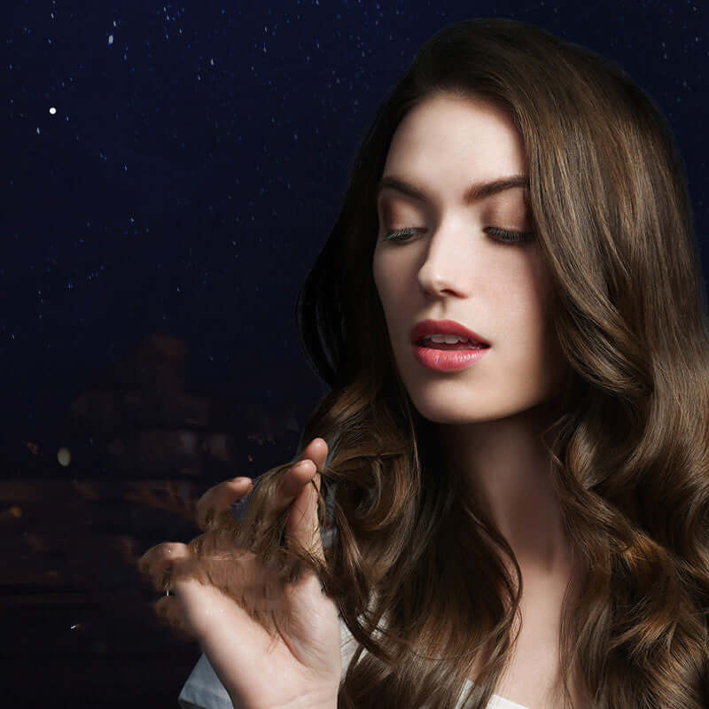 Shampoo-free hair mask inversion featuring a woman showcasing her beautiful, glossy hair against a starry night background.