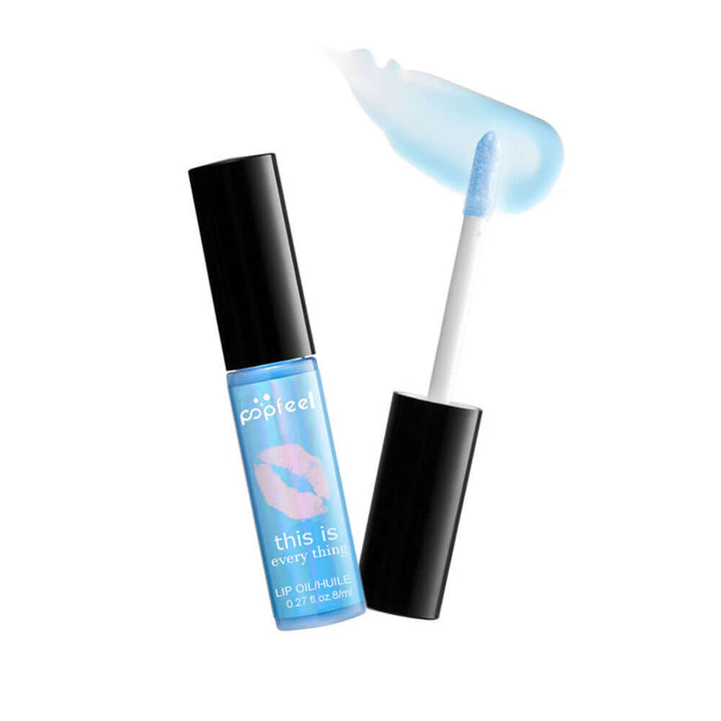 Transparent lip gloss with multivitamins for nourishment, featuring a blue hue and applicator
